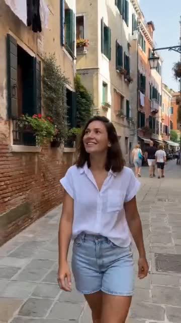 A model turning in a generated fashion clip